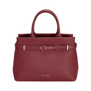 Sac à main structuré avec deux anses, décoré d’une fine ceinture ornée de boucles métalliques sur la partie supérieure.